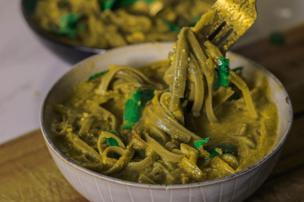Vegan noodle bowl with turmeric buckwheat bok choy and vegetable stock
